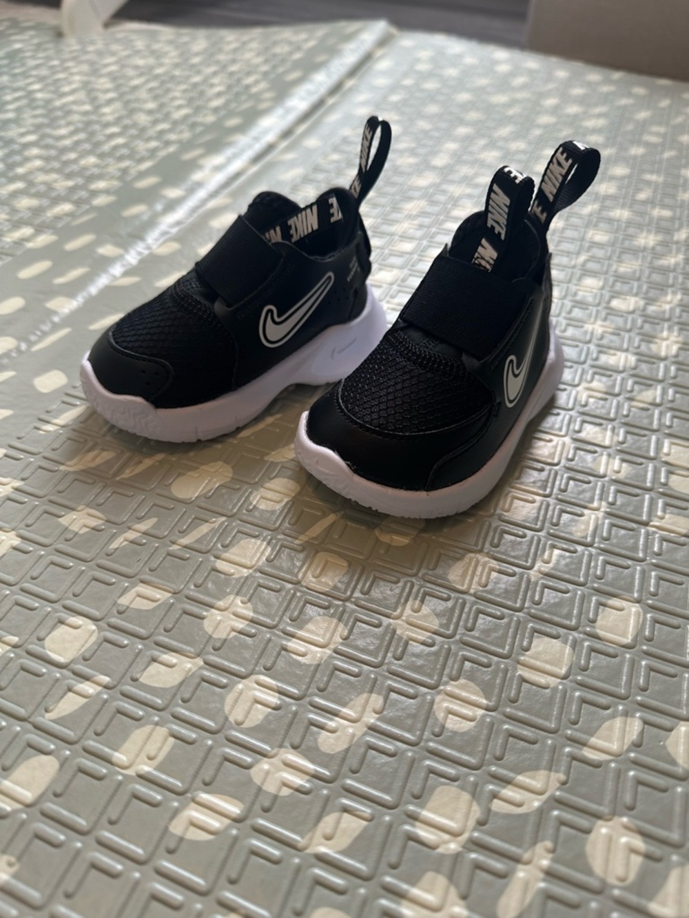 Nike Kids Black and White Slip-On Sneakers with Swoosh